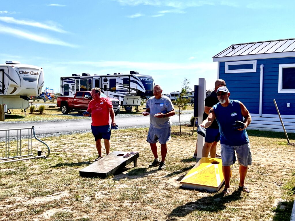 finduscamping campouts for villagers playing cornhole