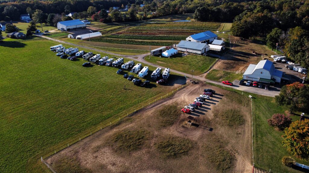 Artist picture of campers lined up at a campout at Suttler Post Farm