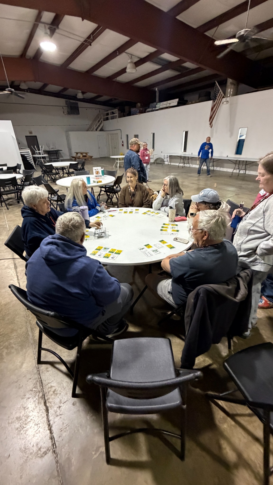 Villagers connecting around a table game