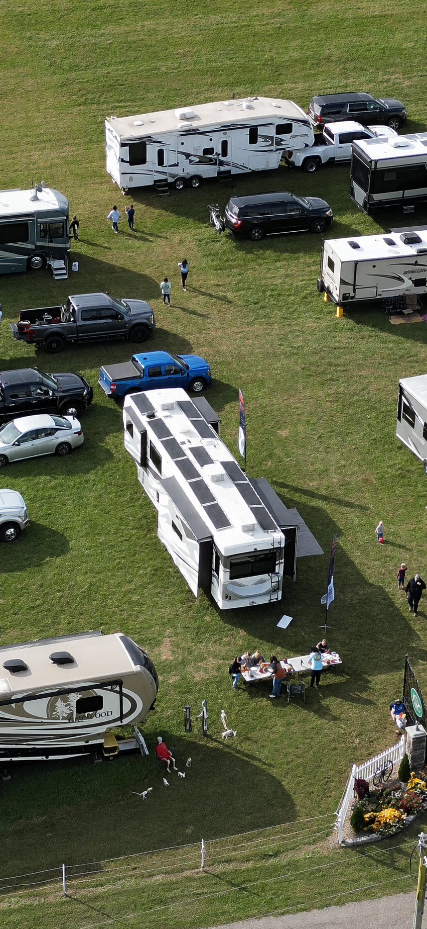 Aerial view of the FindUsCamping MDU displaying its Future Solutions rooftop solar installation at an RV event