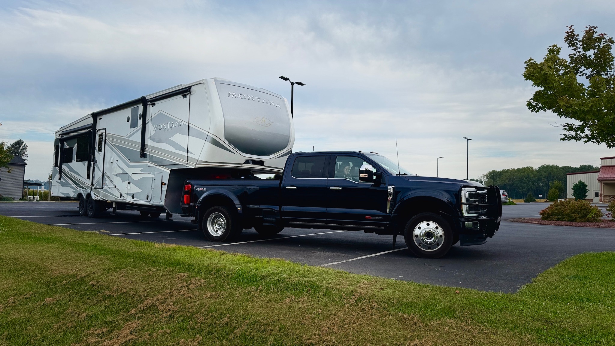 FindUsCamping's 2025 Keystone Montana 3781RL Legacy hitched to the Ford F-450