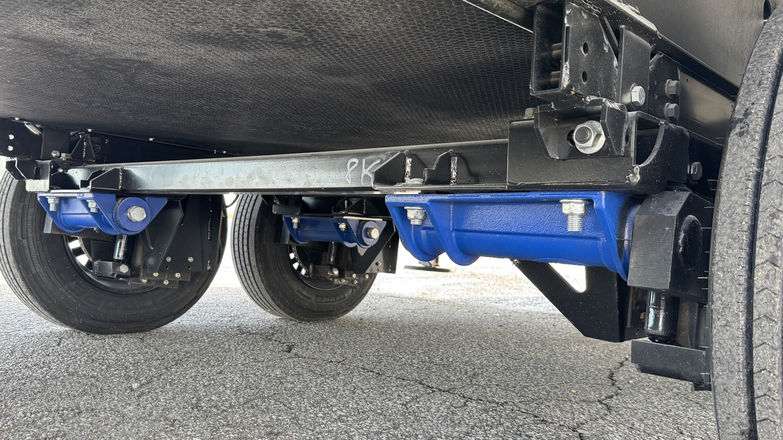 MORryde independent suspension installed under the FindUsCamping 2025 Keystone Montana Mobile Display Unit