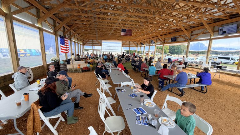 Long tables and good company in the open-air arena