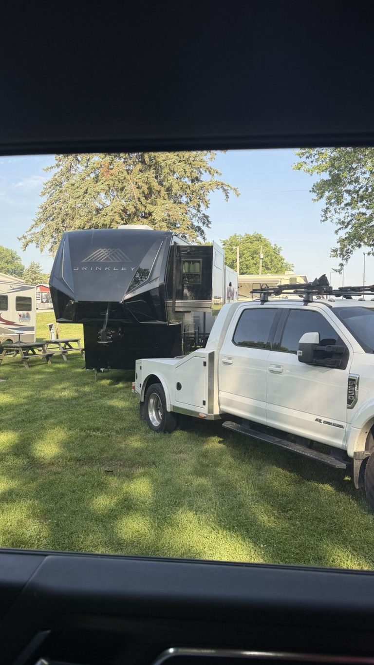 Brinkley fifth wheel seen through the truck window