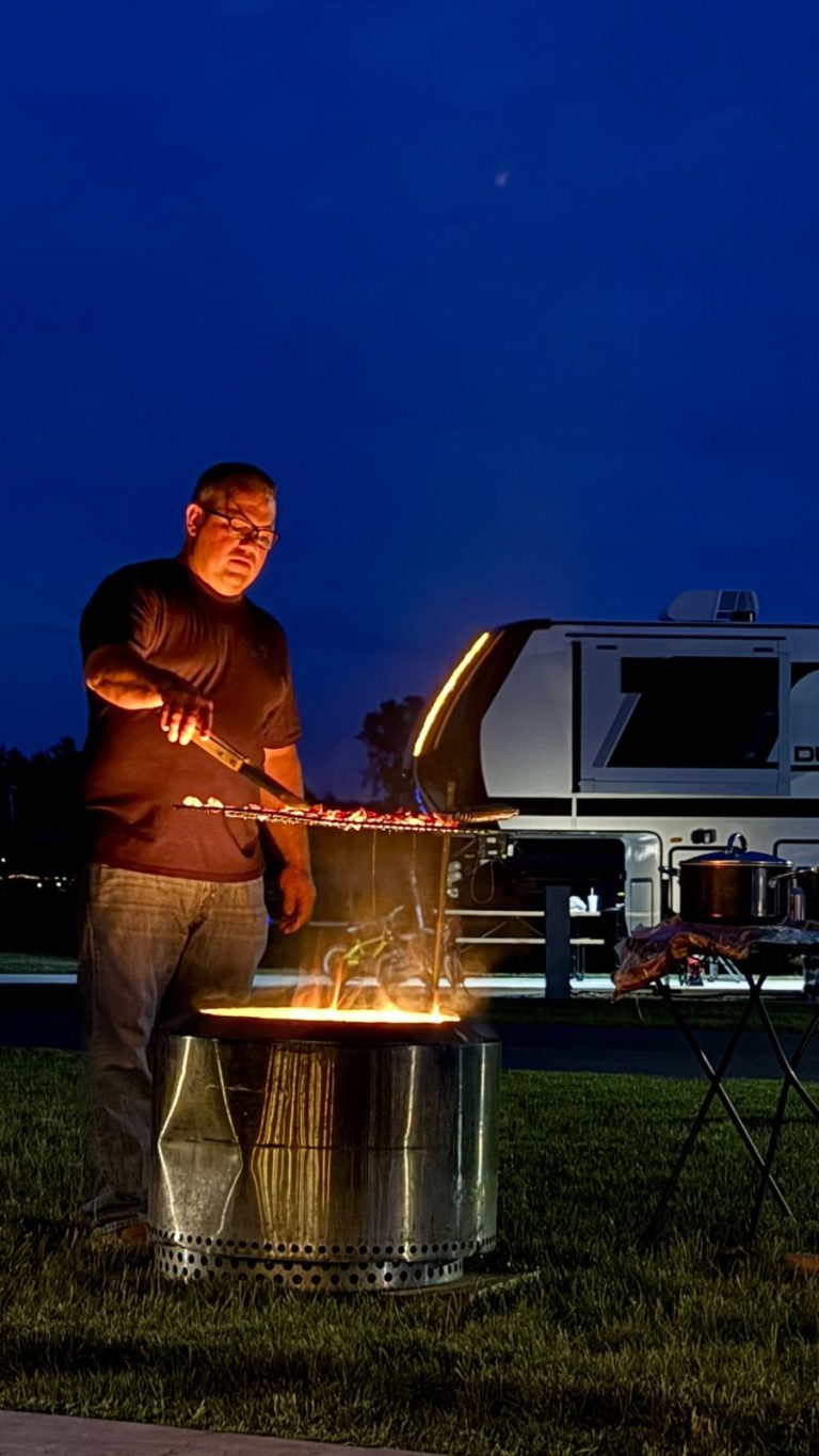 Campfire cooking at night on the last evening of the crawl