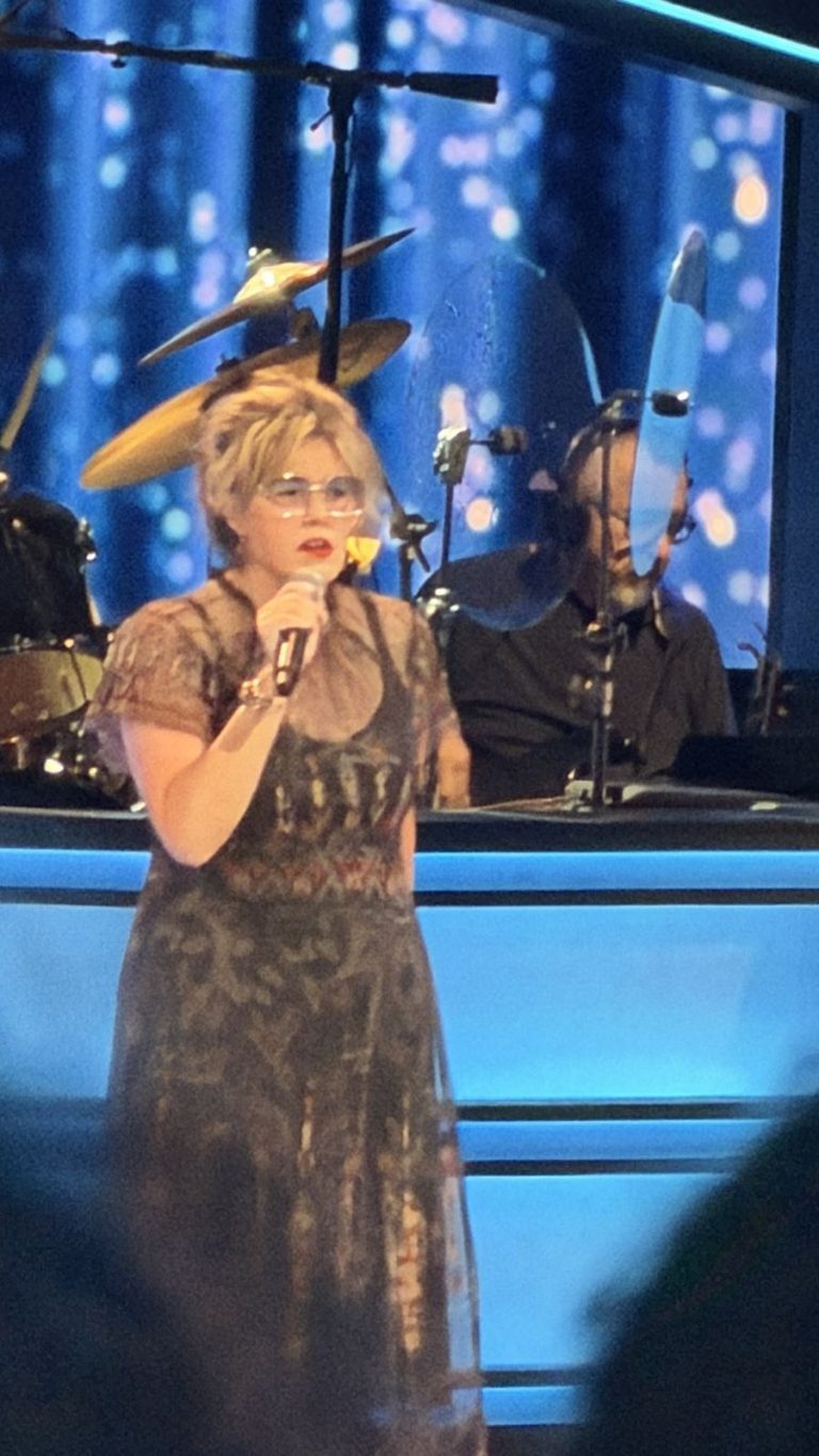 Singer performing live at the Grand Ole Opry