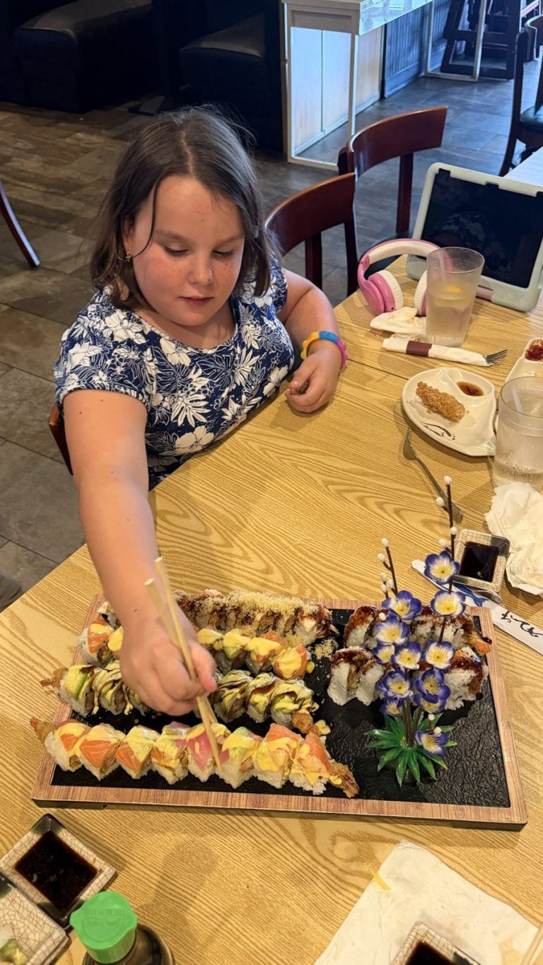 Young villager enjoying a sushi dinner