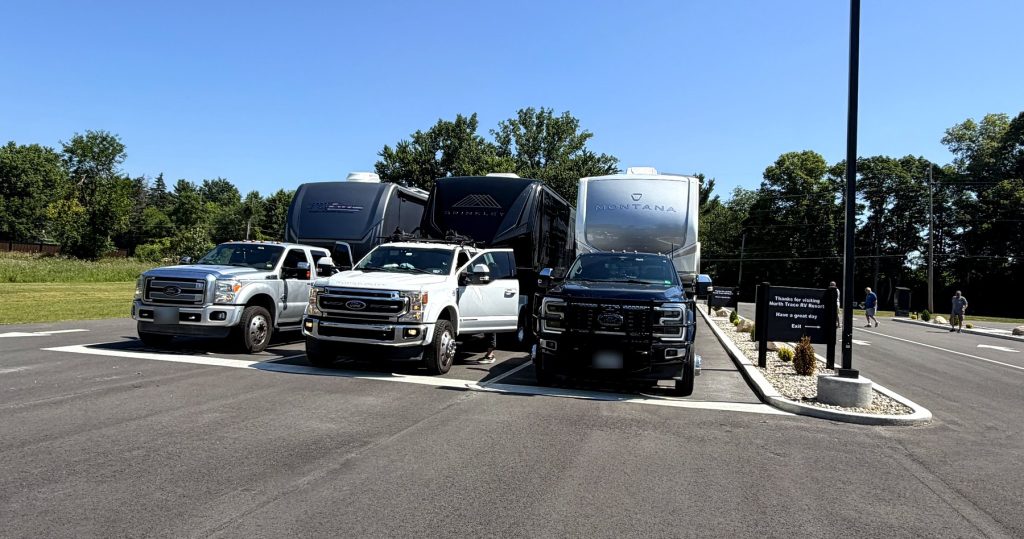FindUsCamping RV Crawl rigs lined up together at North Trace RV Resort