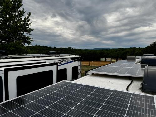 Solar panels on a roof overlooking the race track